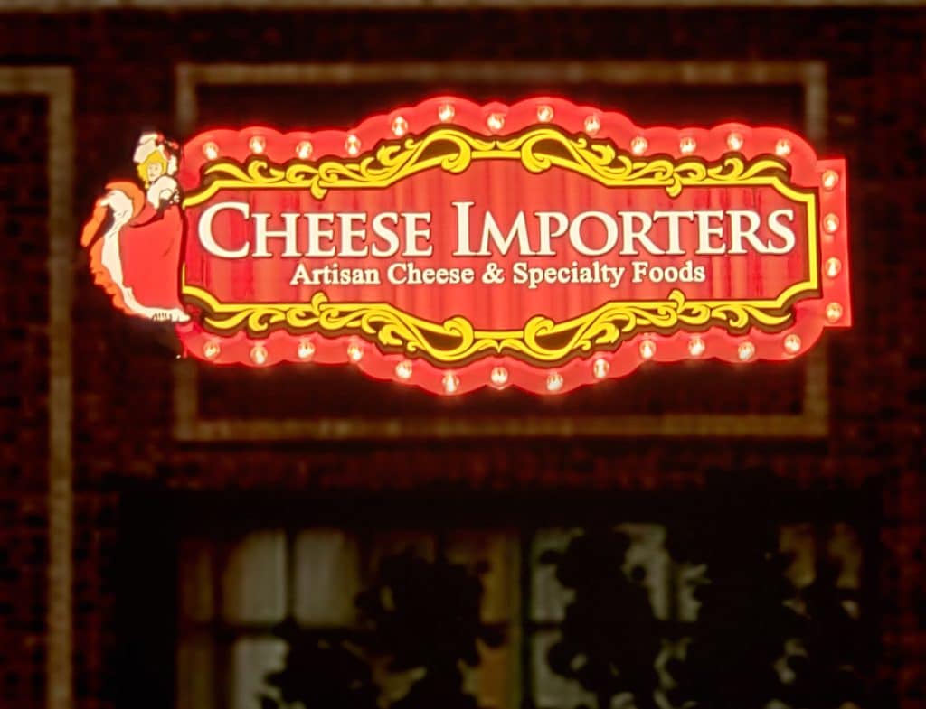 Cheese Importers electric sign